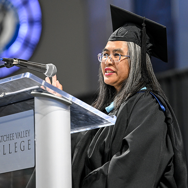 Professor Sompheng Batch speaks at the 2024 graduation ceremony.