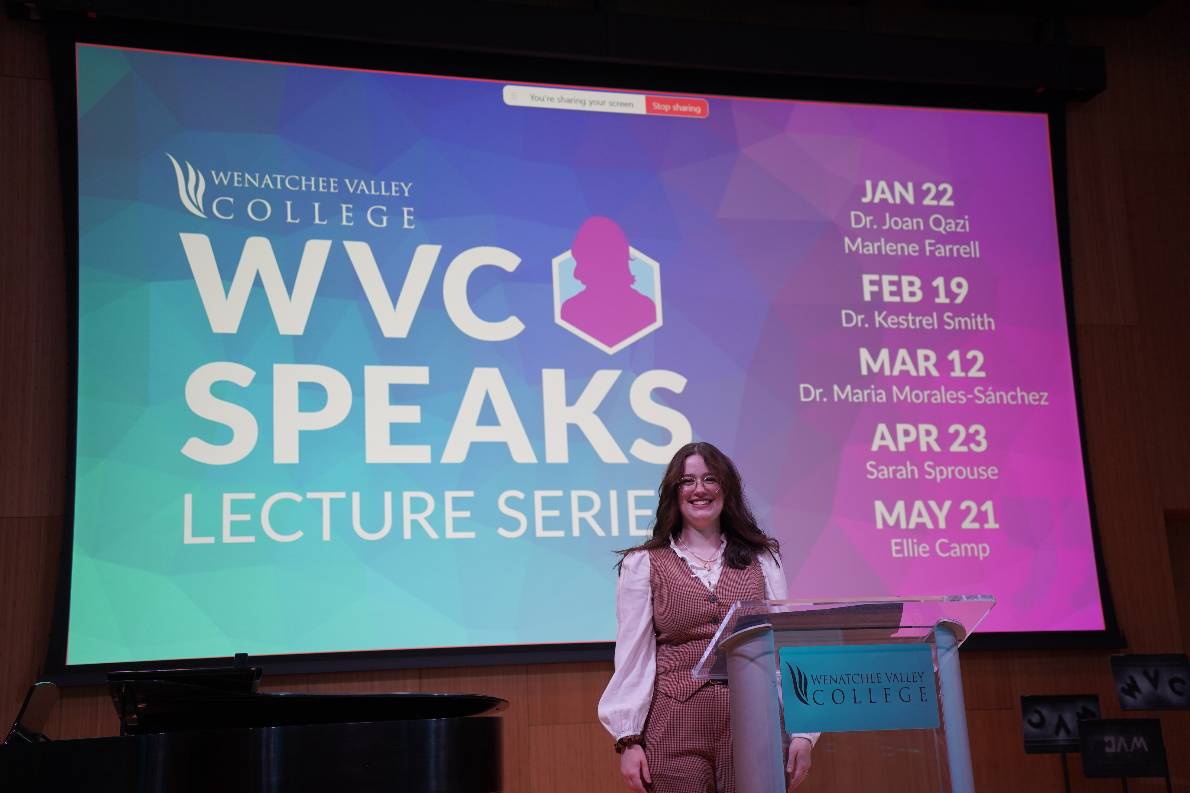 WVC staff member Ellie Camp on stage for WVC Speaks lecture presentation