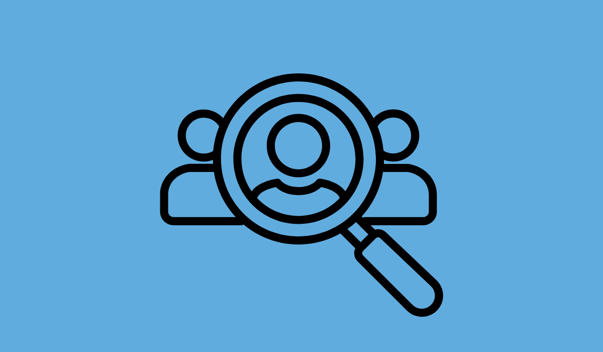 icon showing line drawing of magnifying glass over a person