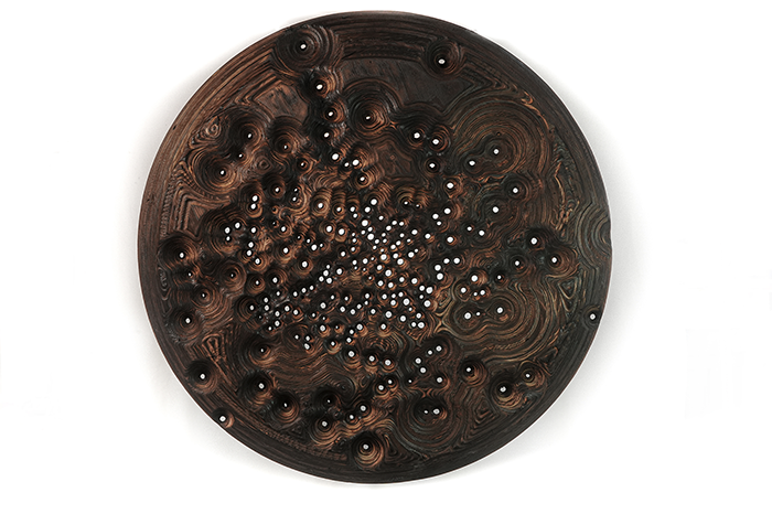 Nik Penny and Scott Broberg's piece "34.05 N, -11.24 W," birch, 46 inches in diameter