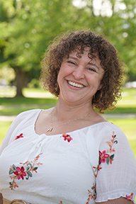 Portrait of Christa Cacciata standing outside
