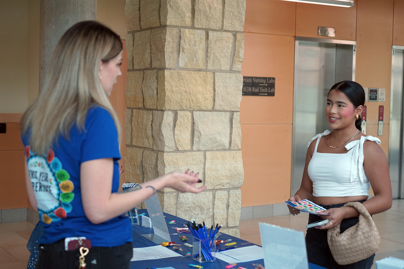 Staff helping student