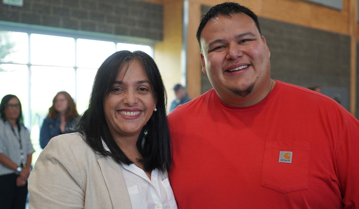 The TRIO director and MESA director stand together and smile at the camera.